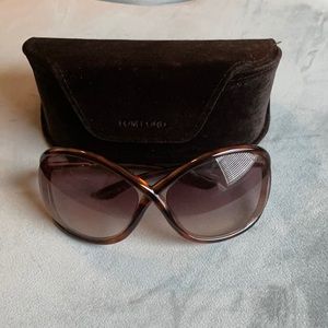 Brown sunglasses with gold accents